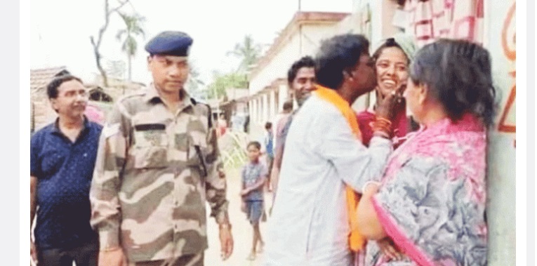 তরুণীকে চুমু খেয়ে বিপাকে বিজেপি প্রার্থী