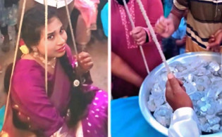 নাতনিকে পাল্লায় তুলে সমান ওজনের কয়েন উপহার দিলেন নানা