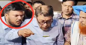 স্বাস্থ্যমন্ত্রীর চামচে ফুঁ দিয়ে ভাইরাল, জানা গেল সেই ব্যক্তির পরিচয়