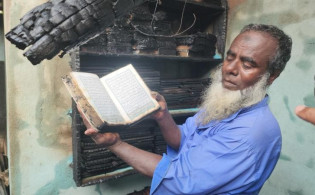 পুড়ে ছাই সবকিছু, অক্ষত রইল পবিত্র কোরআনের পাতা